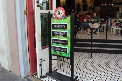 pavement sign for restaurant Photo