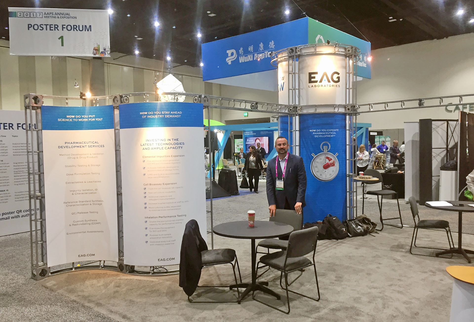 Man standing at table at trade show